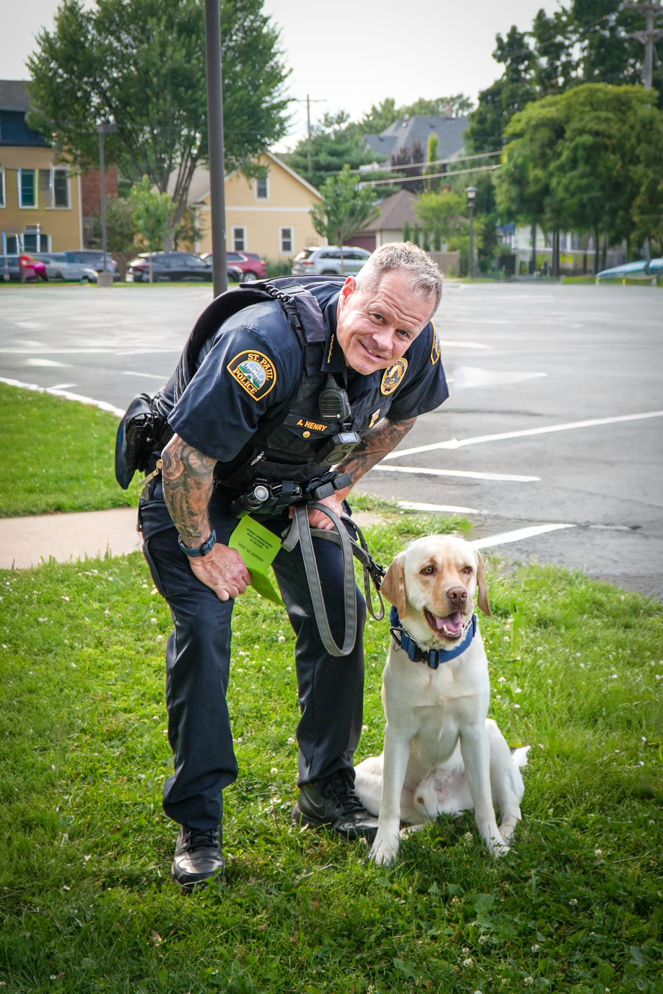 Chief Henry walking his dog, Kasper.