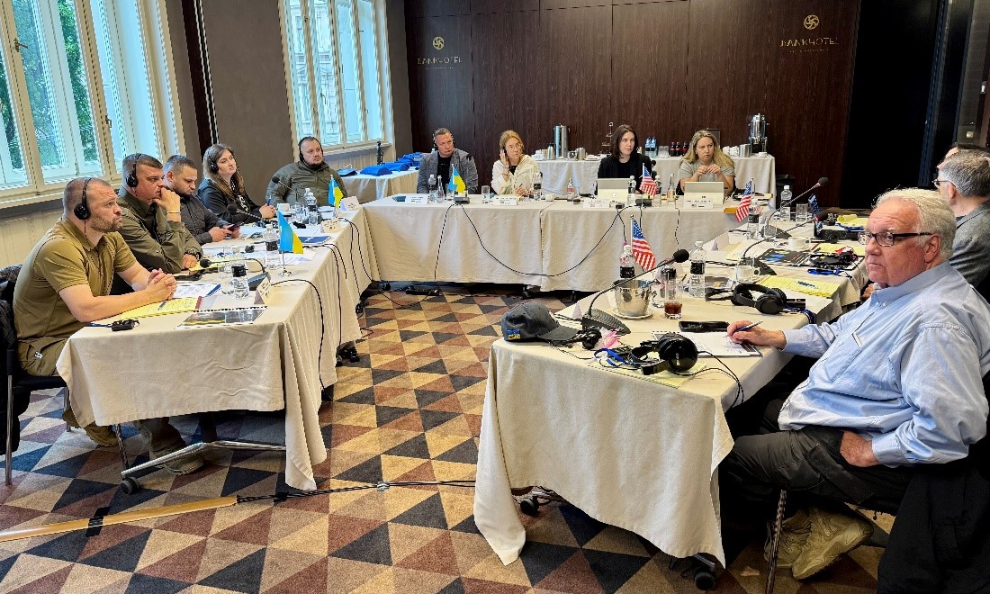 The working group assembled by Howard Buffett (right)